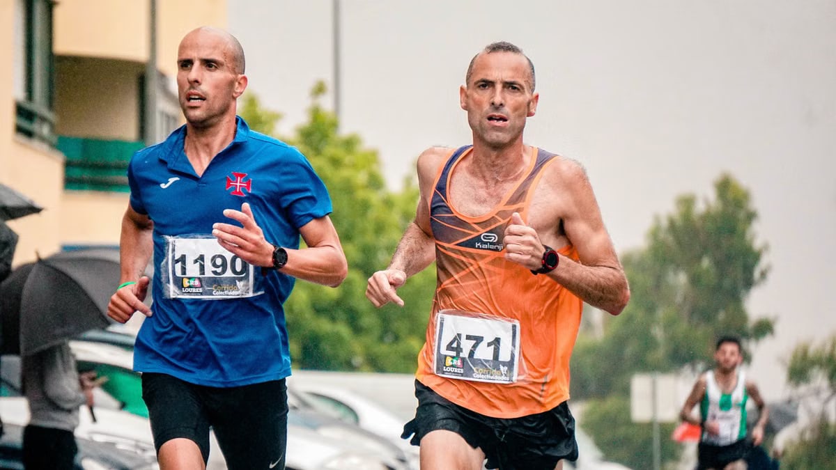 Intense marathon runners pushing forward during an outdoor race, displaying athletic prowess and determination.